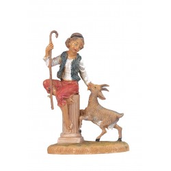 Pastore seduto su colonna