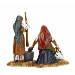 Gruppo donne con pestello