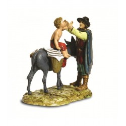 Uomo con bimbo su asino